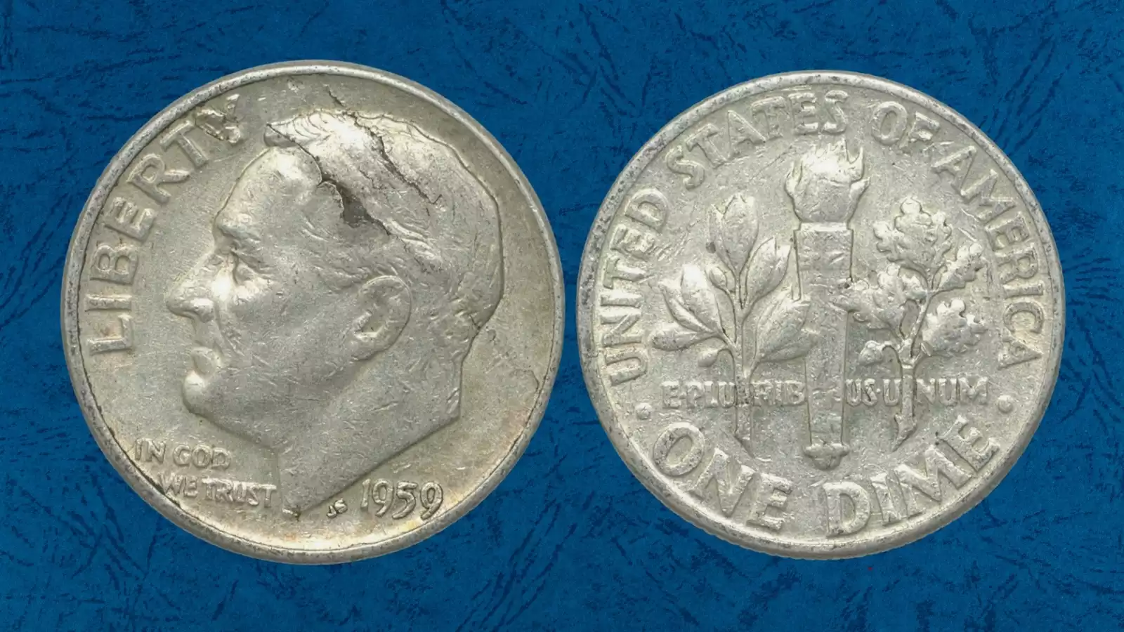 1959 dime lamination error showing silver planchet surface flaking or splitting due to alloy impurity